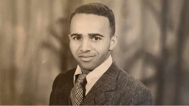 Portrait of young David Blackwell as a young man, wearing a suit and tie
