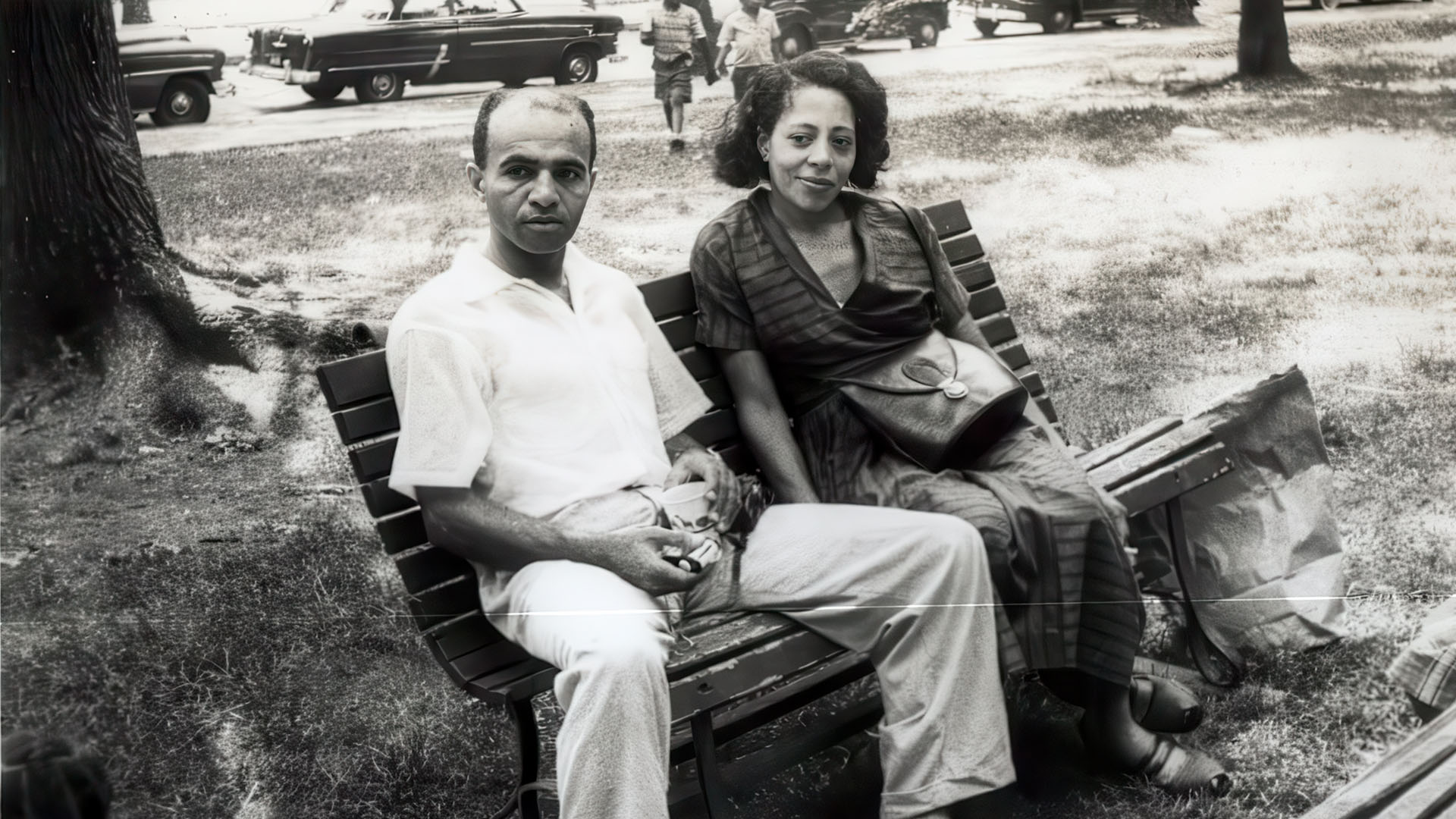 David Blackwell and his wife Ann seated together on a park bench