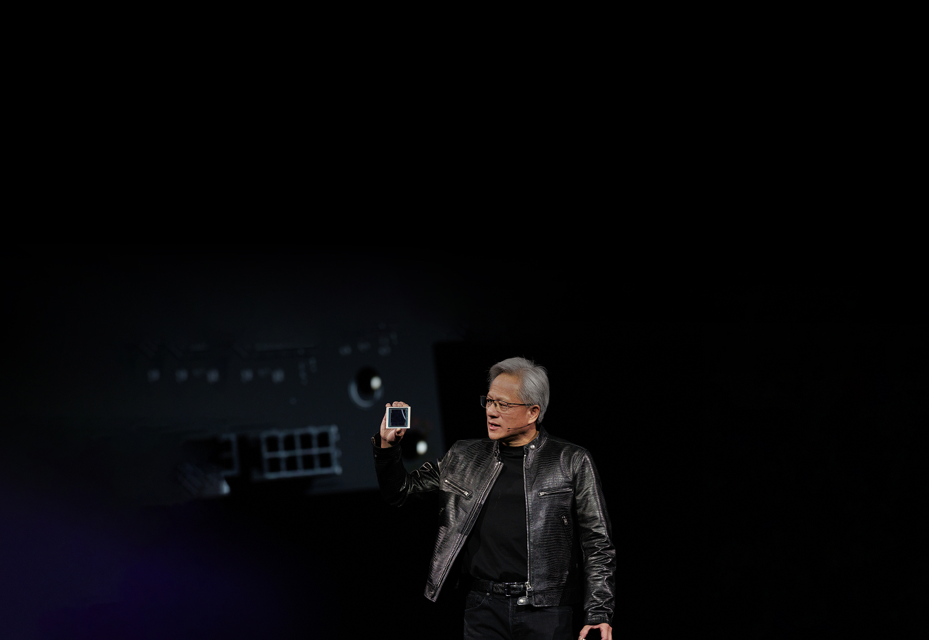 Jensen Huang announcing the Blackwell GPU architecture on stage